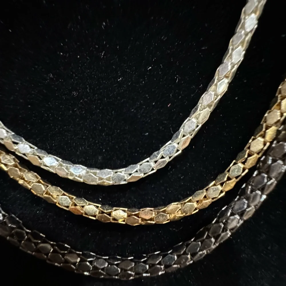 Necklace 3 Strand looks like Gold Silver Platinum. 16 to 20 in adjustabl…